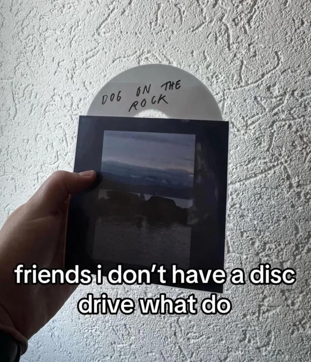 Mac gives fans a copy of an album called "Dog on the Rock" 4